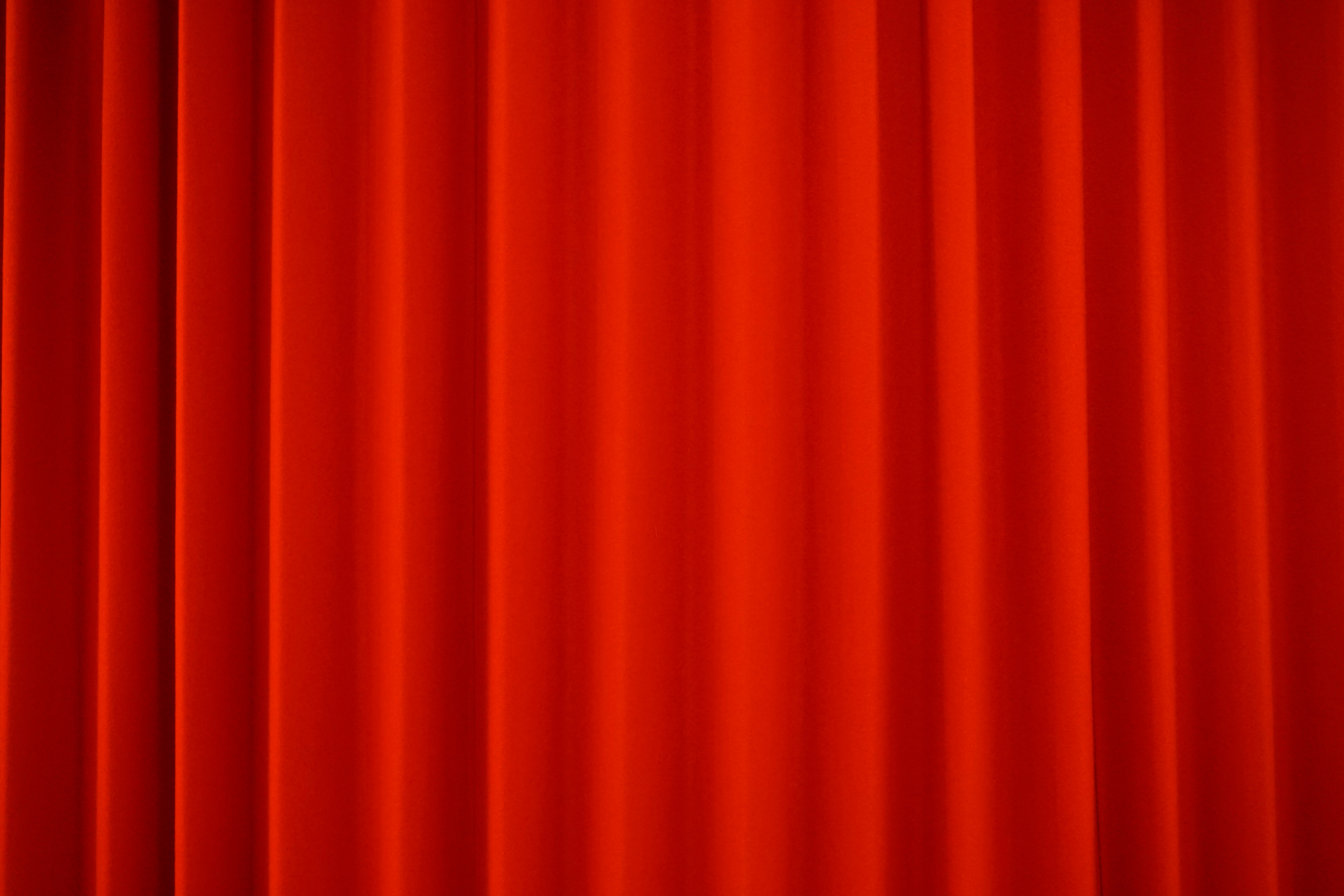 Red curtains, stage.