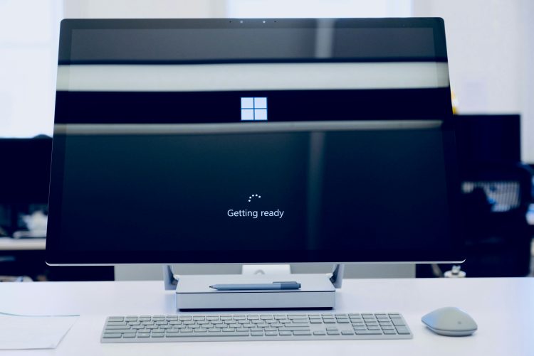 Computer screen displaying Windows logo booting up