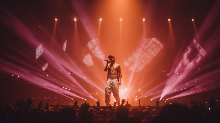 Performer on stage with dynamic lighting