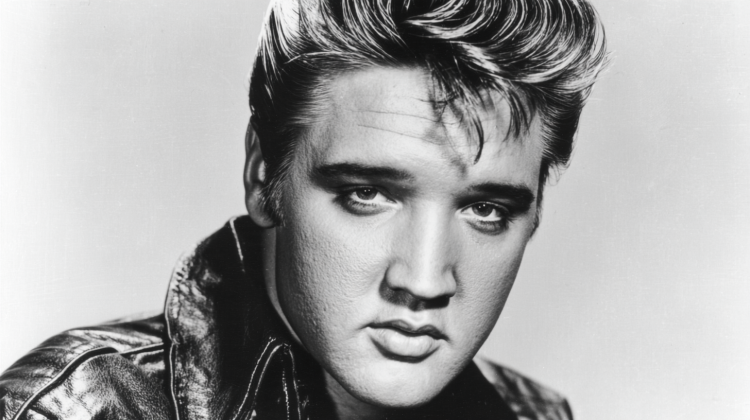 Black and white portrait of a man in leather.