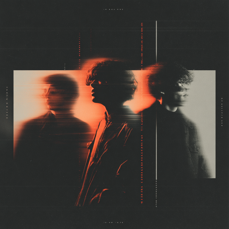 Blurred portrait of three people with red lighting.