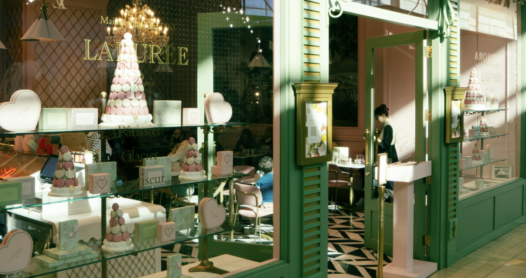 Elegant patisserie interior with macarons display.