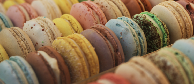 Colorful assortment of macarons in a row