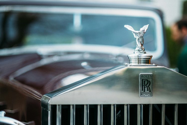 Close-up of Rolls Royce hood ornament.
