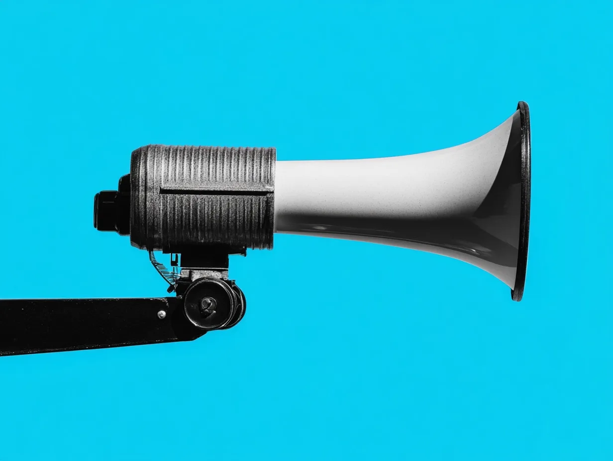 Black and white megaphone on blue background